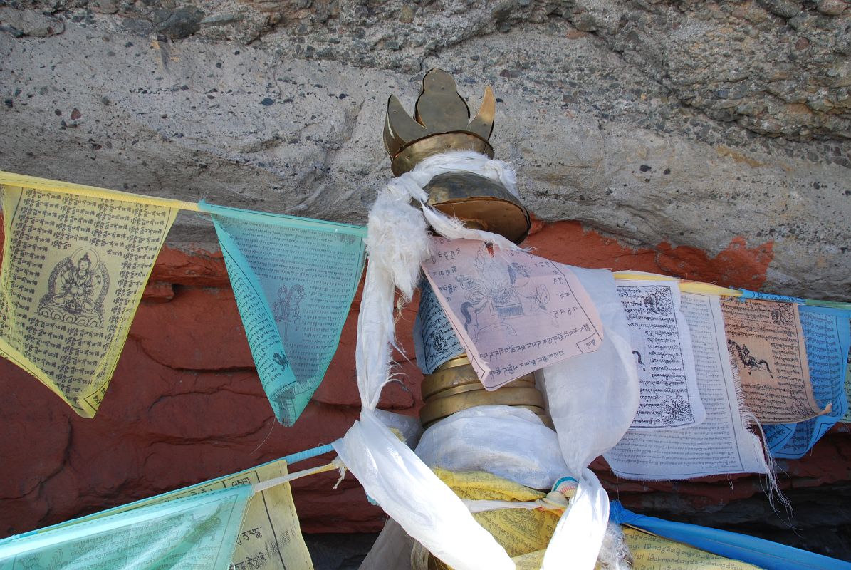 24 One Of The 13 Golden Chortens On Mount Kailash South Face In Saptarishi Cave On Mount Kailash Inner Kora Nandi Parikrama Here is a close up of one of the 13 Golden Chortens on Mount Kailash South Face in Saptarishi Cave (11:32).